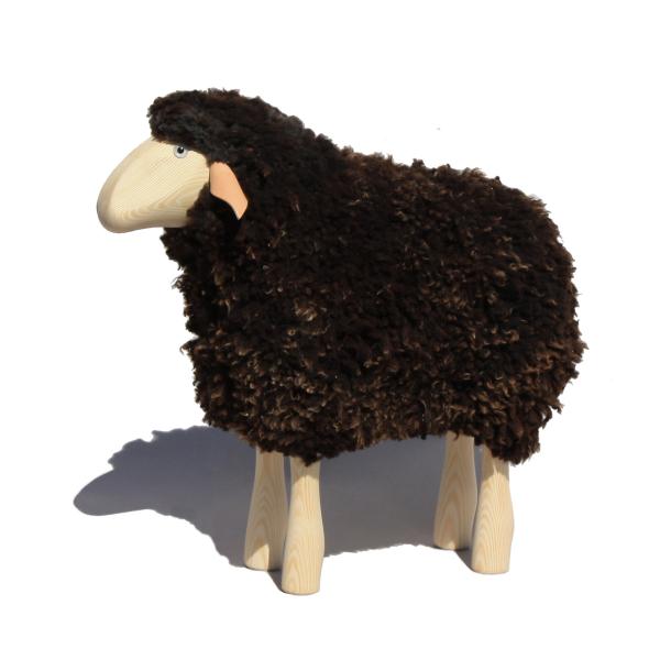 lamb, curly brown fur, pine wood ("outdoor")